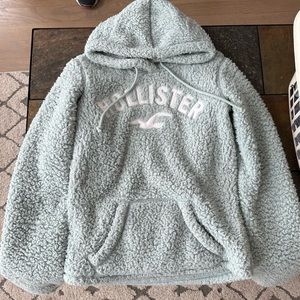 girls mint green fluffy hoodie. Worn a few times but still in good use.